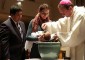 Archbishop Schnurr baptizes Anthony Michael Lopez with parents Ryan and Catherine. (Courtesy Photo)