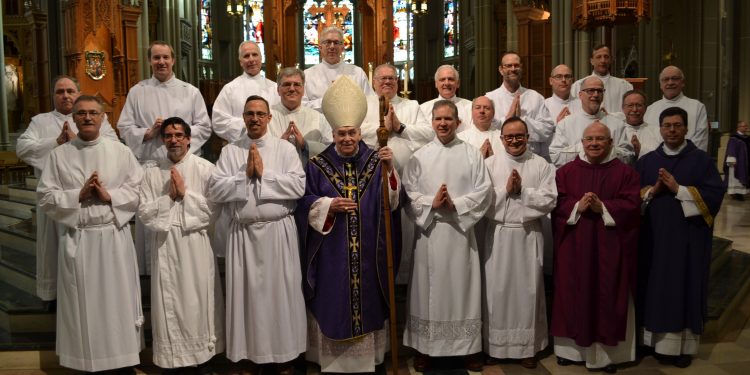 Row 1 (L to R): Steve Broering, Peter Caccavari, Greg Doud, Bishop Foys, Graham Galloway, Nathan Beiersdorfer, Fr. Paul Keller (representing Mt. St. Mary’s Seminary), Deacon Mark Machuga (Director of the Office of the Diaconate)