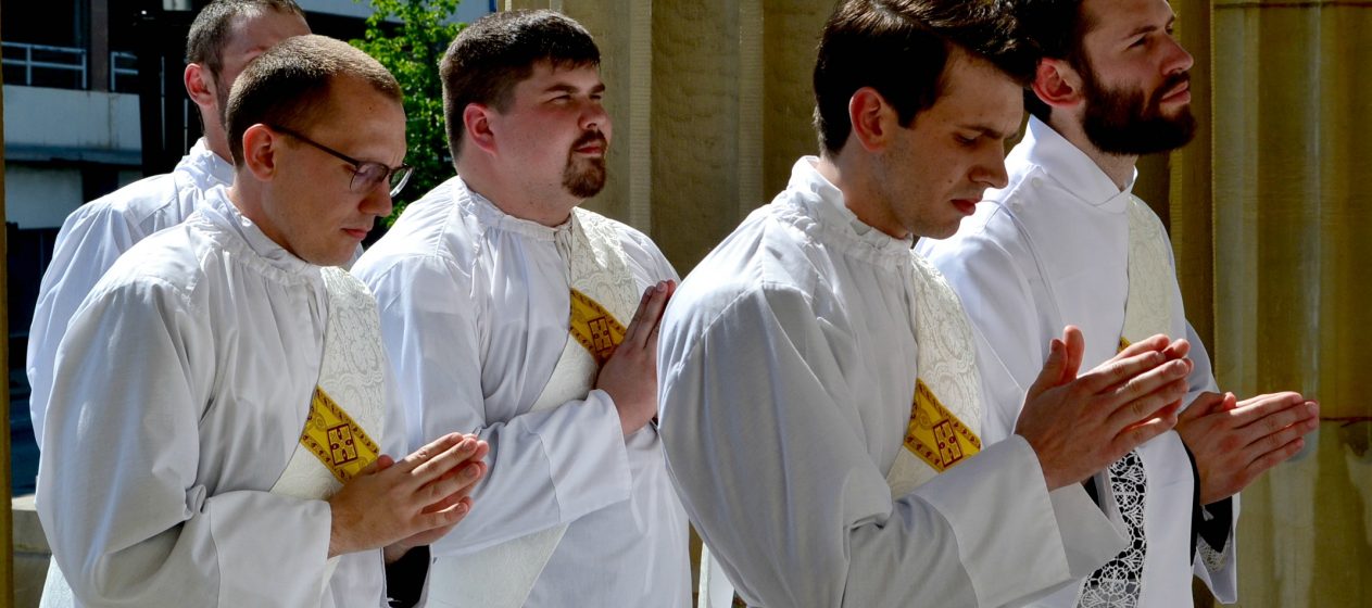 Front Row, Deacon Andrew Hess, Deacon Ambrose Dobrozsi; 2nd Row: Deacon Jeff Stegbauer, Deacon Mark Bredestege entering the Cathedral of St. Peter in Chains. (CT Photo/Greg Hartman)