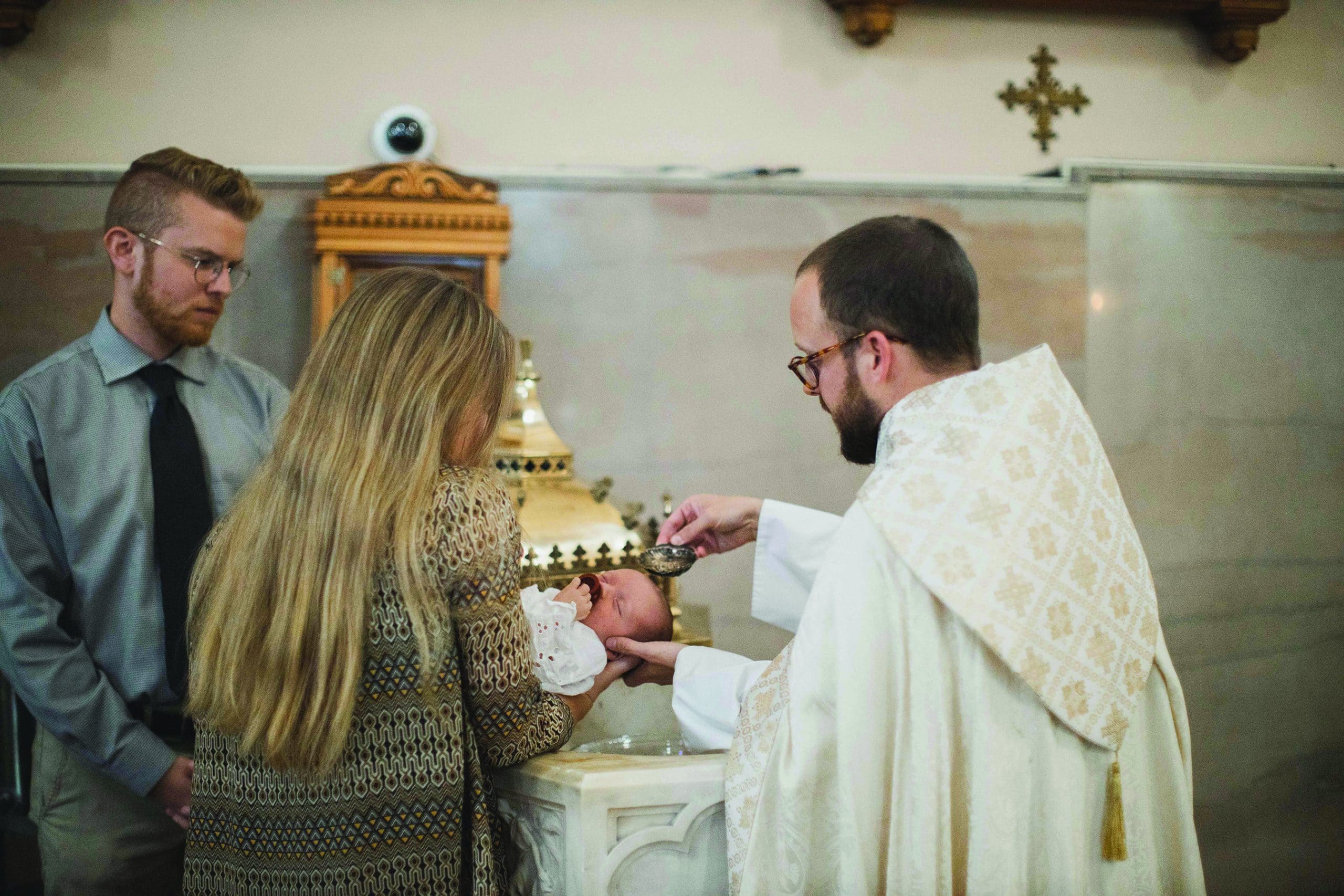 catechism of the catholic church baptism godparents